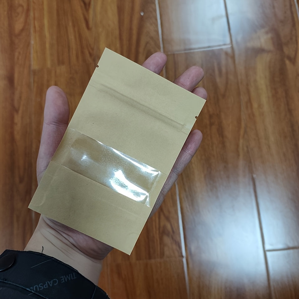 60 Kraft qog'oz sumkalar, qayta ishlatiladigan yopish zipperslari, shaffof oynalar, oson yirtiladigan U-shaklidagi dizayn bilan