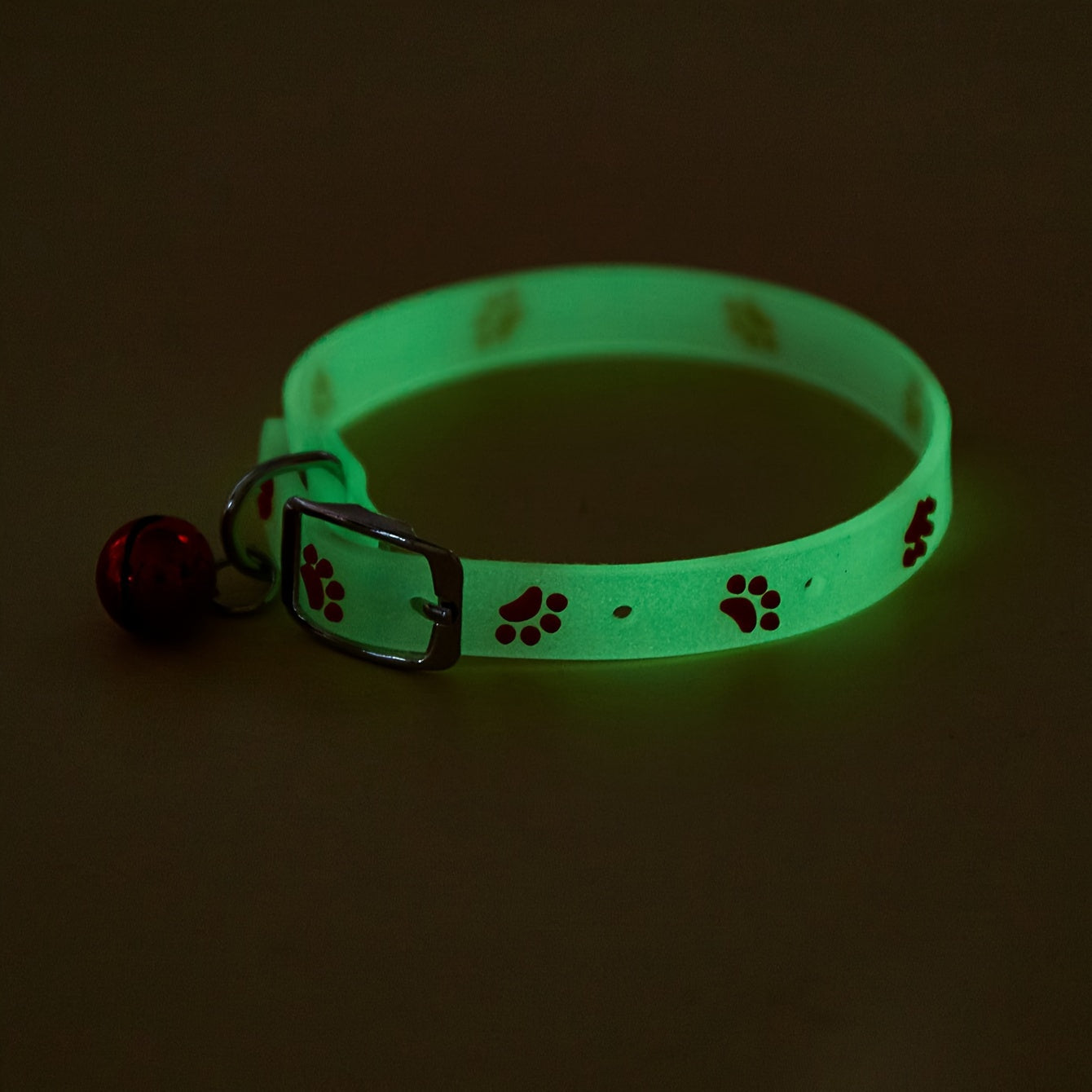 Adjustable Glow-in-the-Dark Cat Collar with Colorful Paw Print and Rubber Material