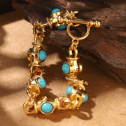 Gold-Plated Alloy Bracelet for Women with Turquoise Accents and Geometric Links
