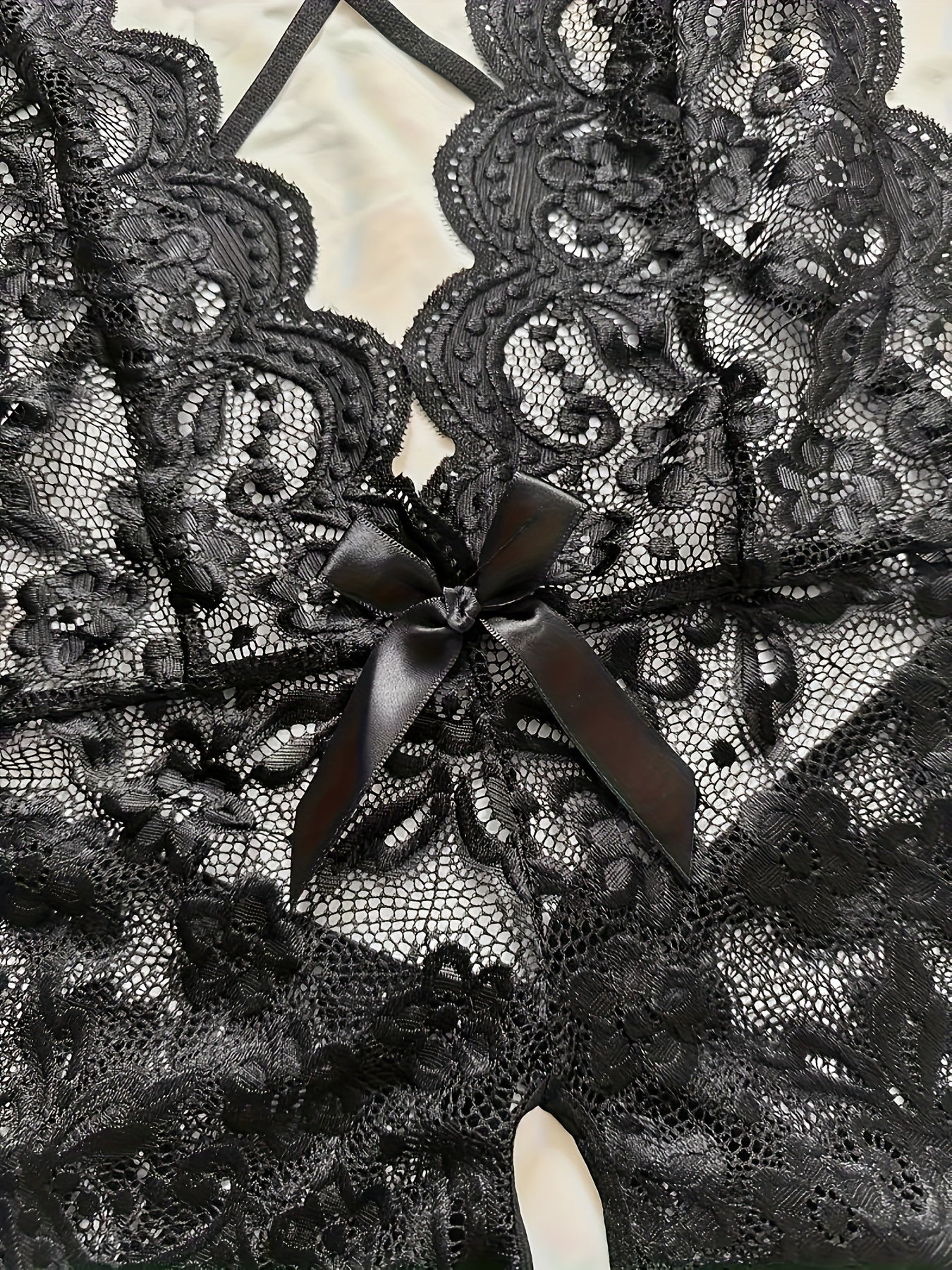 Jinsiy dantella kamon teddy, ochiq qorin va tasma orqa dizayni bilan, ayollar uchun ichki kiyim uchun mukammal.