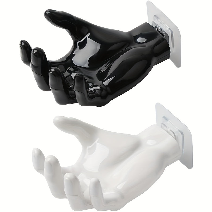 Uyda kalitlar va quloqchinlar uchun kuchli, burgusiz, iz qoldirmaydigan saqlash uchun palma shaklidagi yopishqoq devor osgichi.