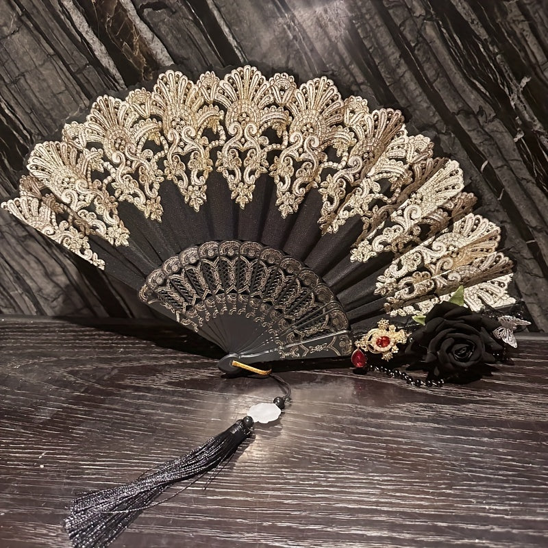 Ayollar uchun yozgi partiya va raqs uchun qora tilla qoʻl bilan ushlanadigan fan