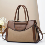 Retro uslubidagi, katta sig'imli va ayollar uchun ko'p funksiyali dizaynga ega zamonaviy Sevgi kuni sumkasi.