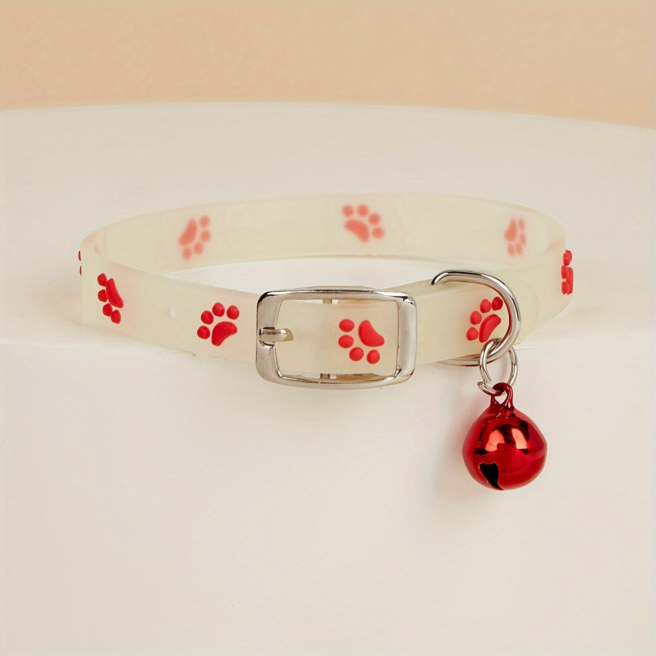 Adjustable Glow-in-the-Dark Cat Collar with Colorful Paw Print and Rubber Material