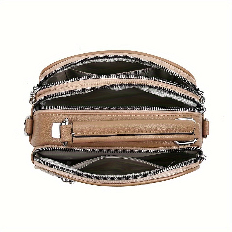 Qora Mini Crossbody sumkasi, ayiqli tassel va bir nechta bo'limlar bilan