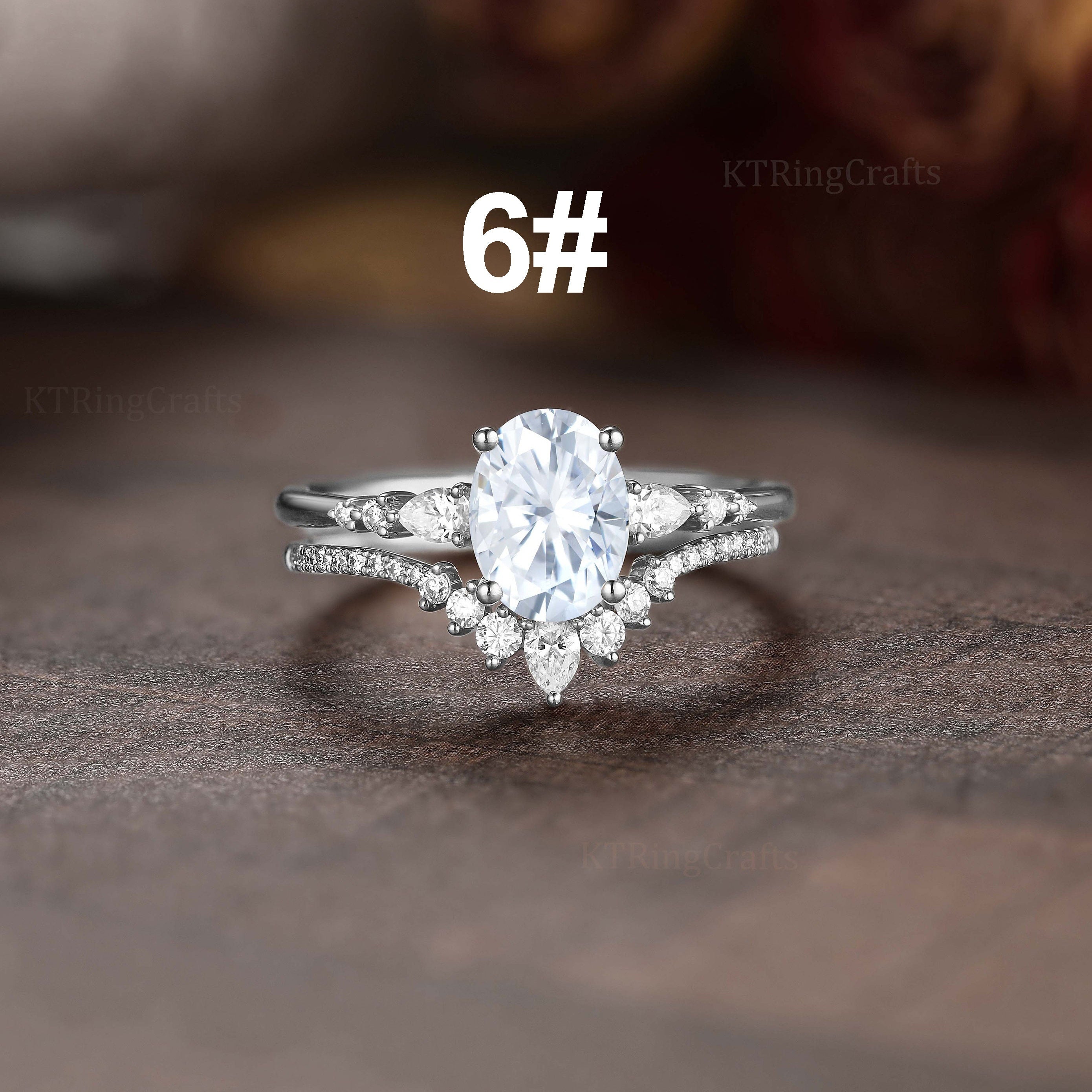 Elegant Egg-Shaped Engagement Rings for Women with Oval Cubic Zirconia Center and Teardrop Accents