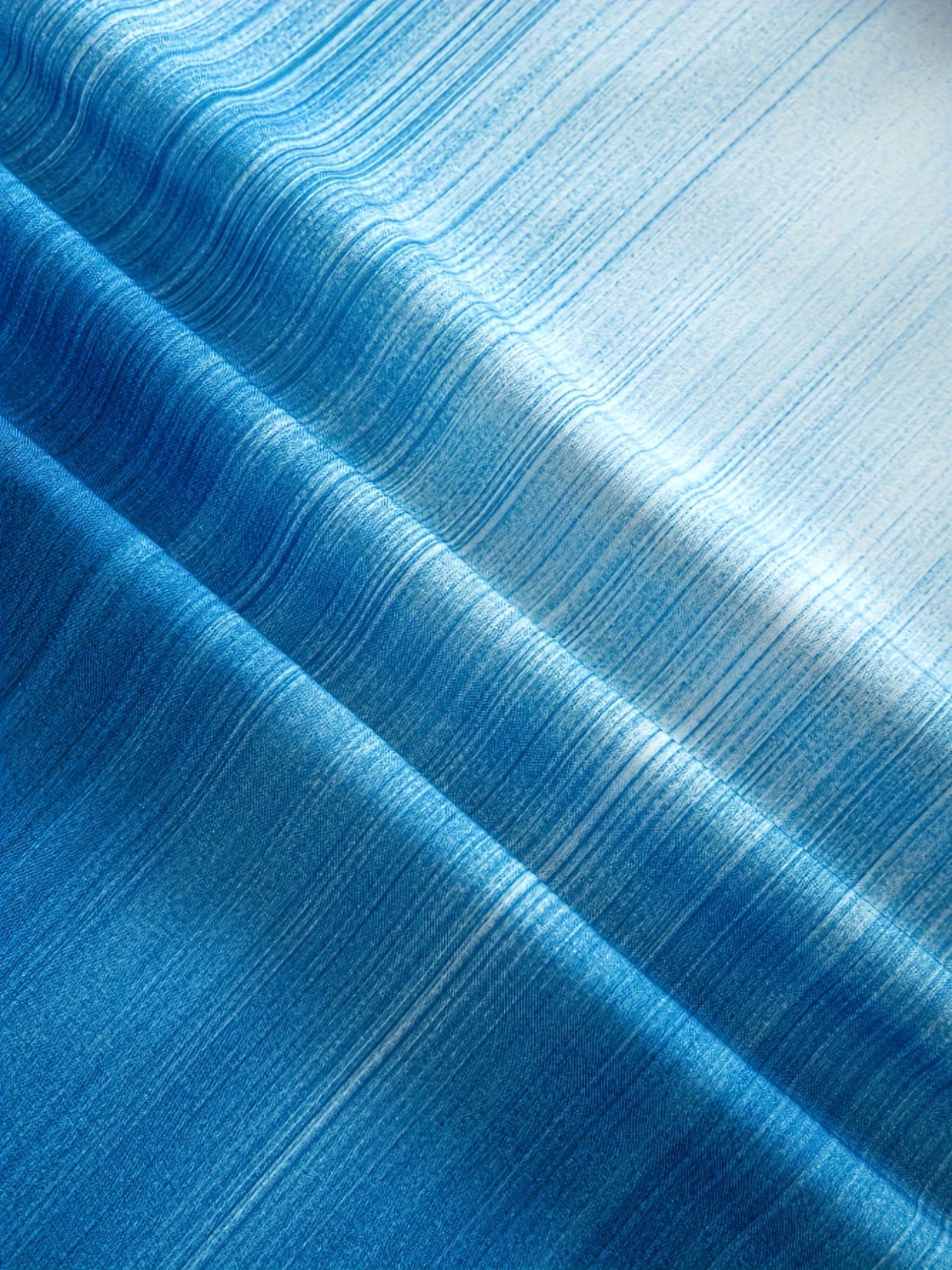 Yengil polyesterdan tayyorlangan, ko'krak cho'ntagi va mashinada yuvish imkoniyati bilan ta'minlangan, erkaklar uchun gradient Gava tugmachali ko'ylak, KATTA O'LCHAMDA mavjud. Yozgi ta'til uslubi uchun ideal.