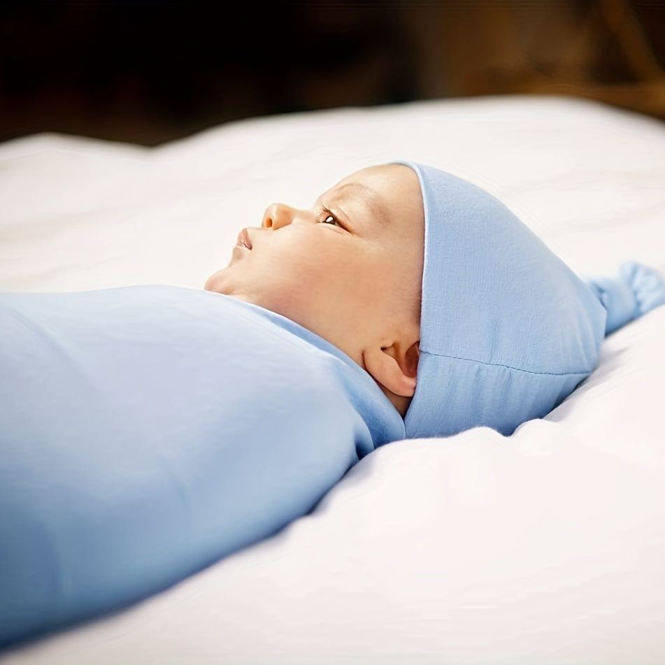 Yangi tug'ilgan chaqaloqlar uchun o'ralgan ko'ylak va shlyapa to'plami, o'g'il va qiz bolalar uchun.