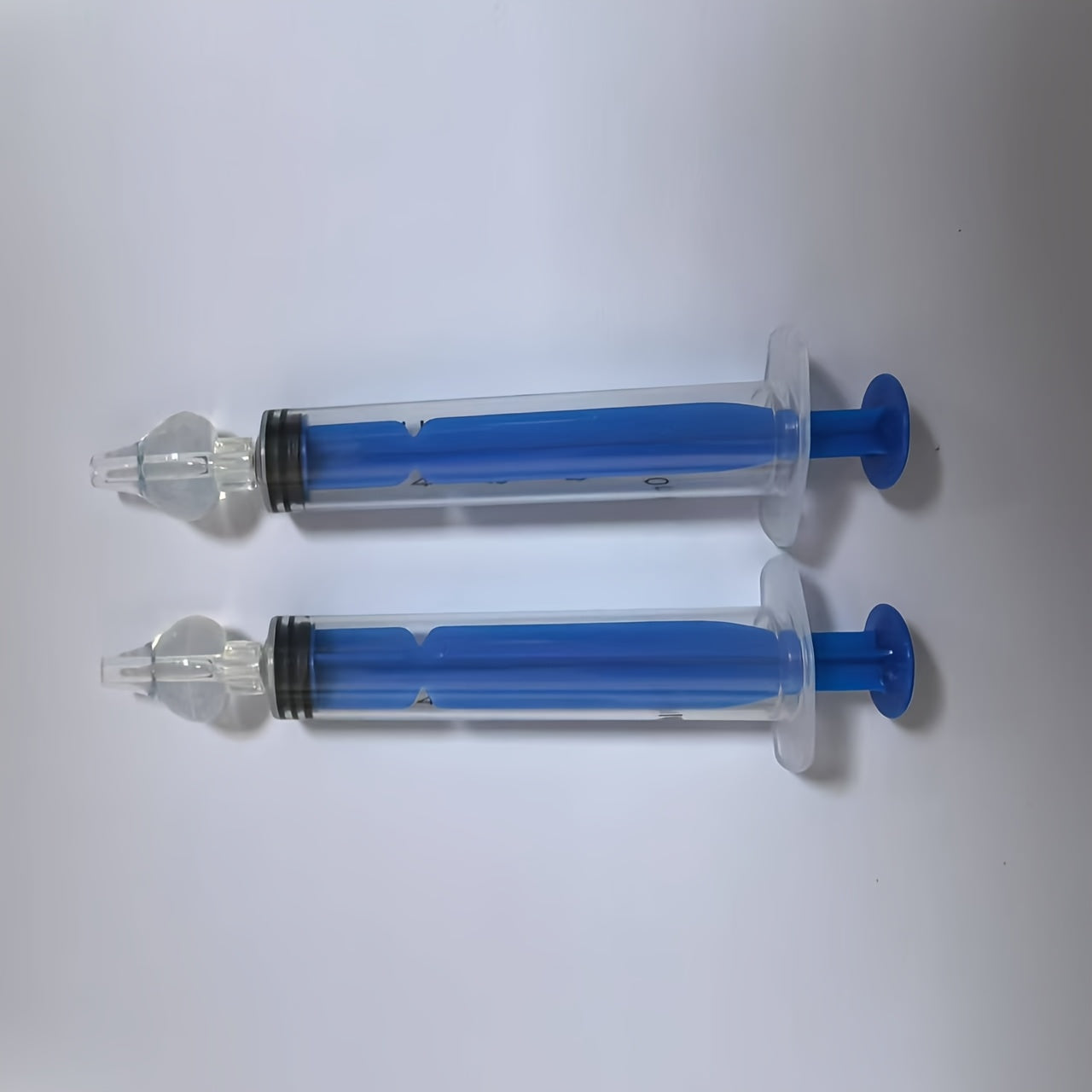 Многоразовый набор детских назальных аспираторов с 2 силиконовыми очистителями для носа в белом, розовом и синем