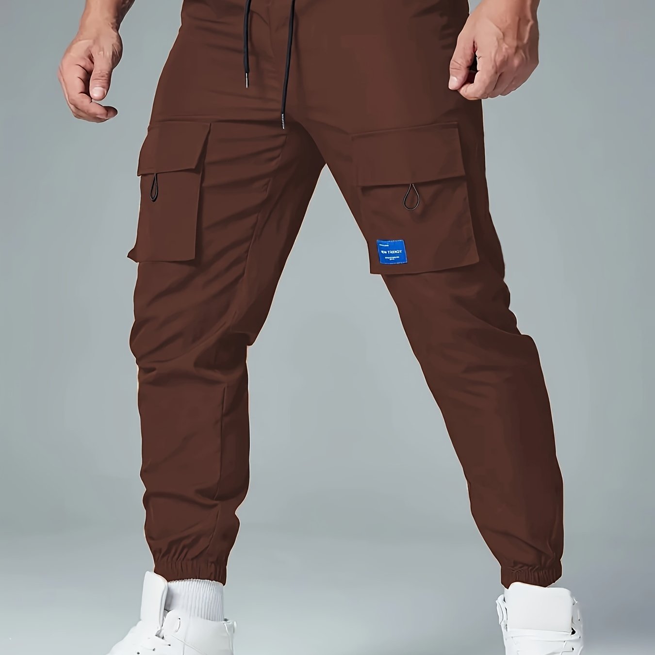 Men's Polyester Cargo Pants with Drawstring Waist and Multiple Pockets for Spring and Fall