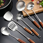 Seven-Piece Stainless Steel Cooking Utensil Set with Rotating Storage Stand