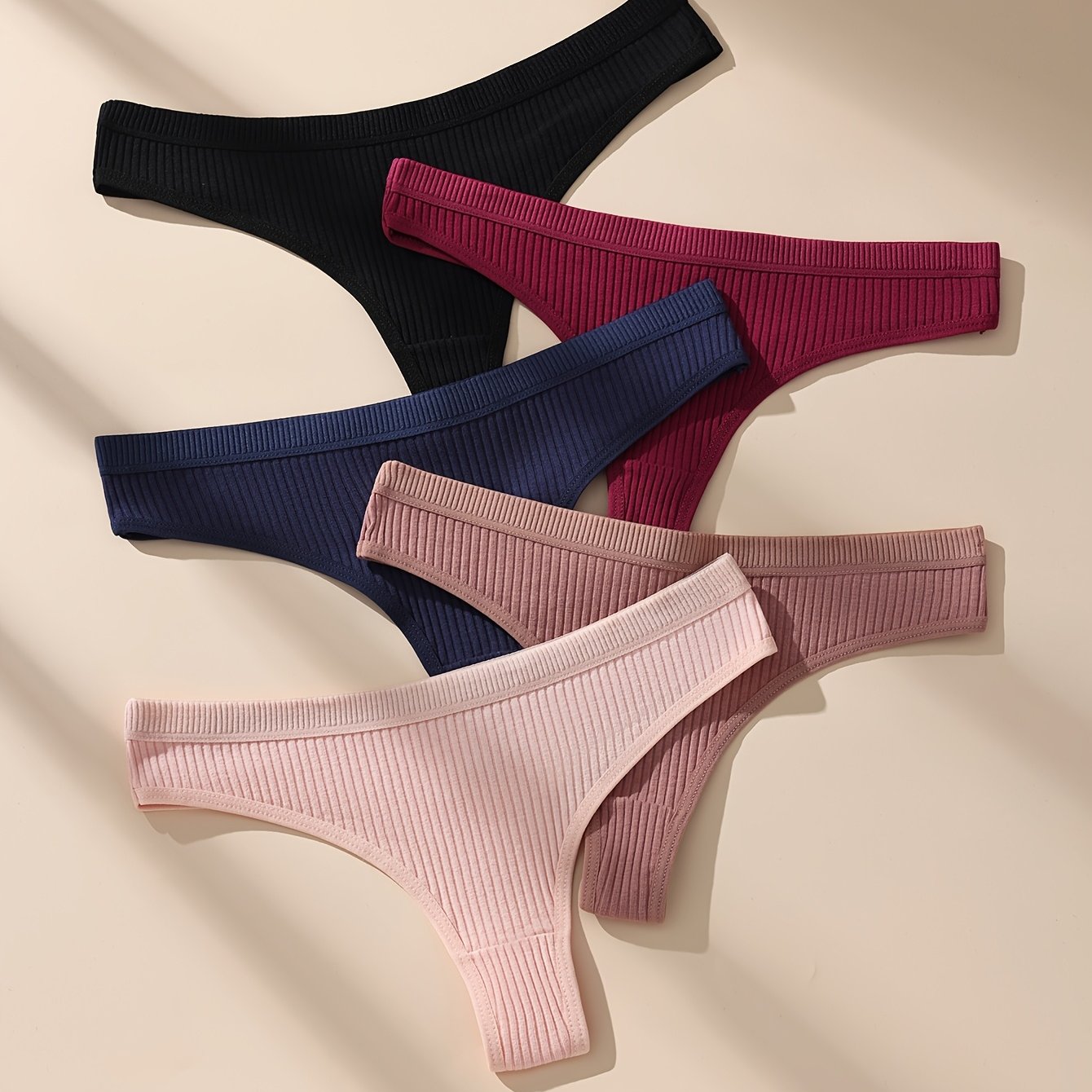 Ayollar uchun 5 ta to'plam pastki qism T-orqa thonglar, qulay moslik uchun tikuvsiz ribbed to'qima va mustahkam ranglardan tayyorlangan sexy paxta.