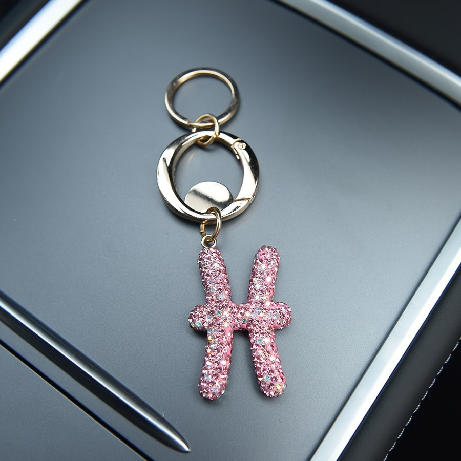Llavero de resina rosa y metal con cristales para bolsos y mochilas