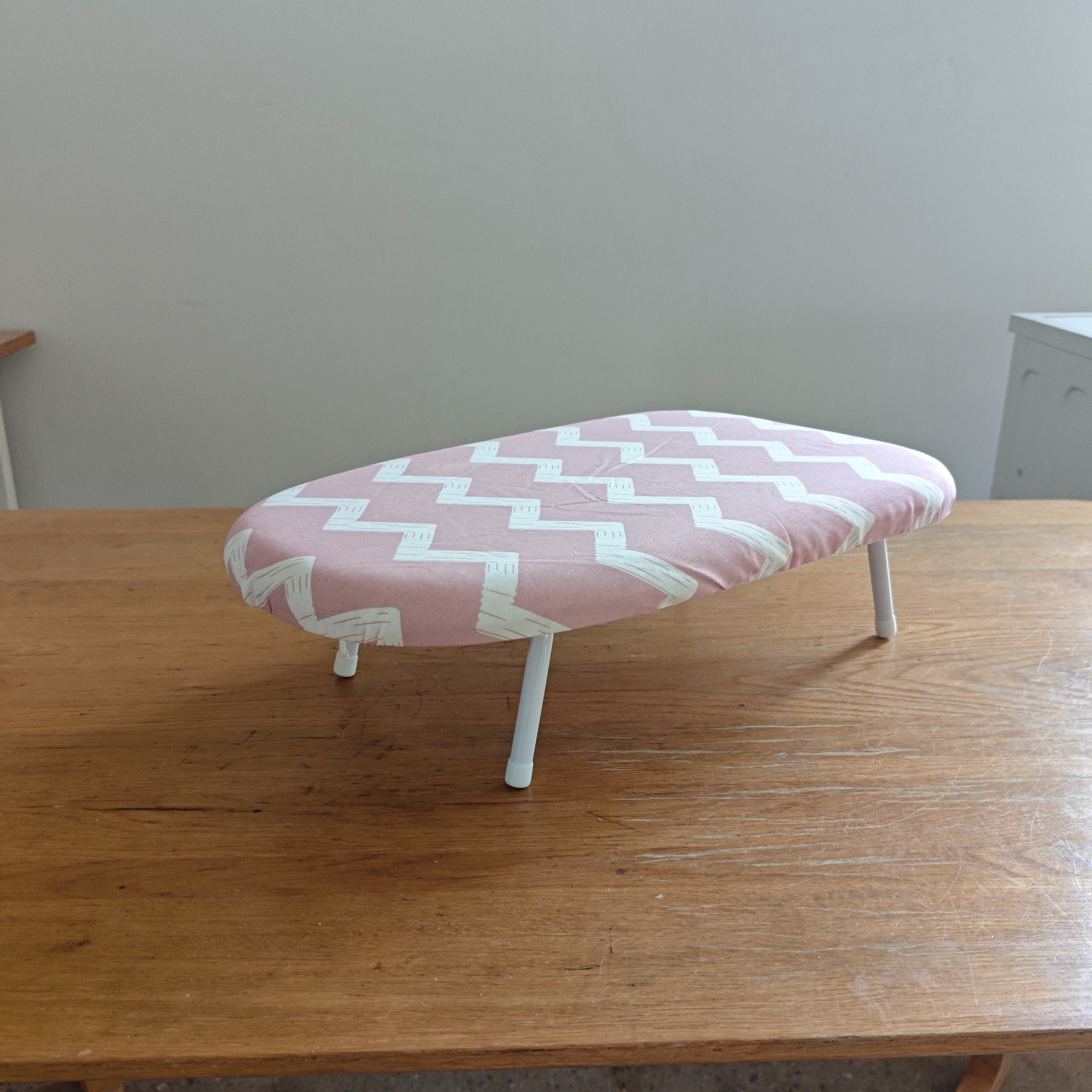 Pink and White Herringbone Foldable Ironing Board with Compact Surface