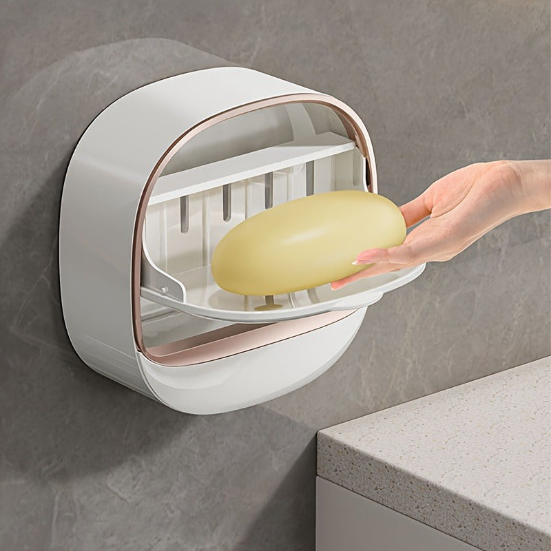 Duvorga o'rnatiladigan qopqoq bilan oval oq sabun idishi, tartibli hammom saqlash uchun.