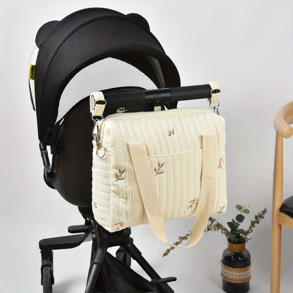 Spacious Embroidered Diaper Bag with Milk Bottle Organizer Multi-Functional Baby Stroller Hanging Bag