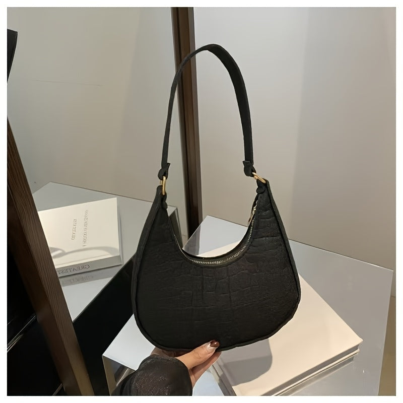 Zamonaviy ayollar uchun yelka sumkasi, clutch aksessuari, zipper yopilishi va o'rnatilgan tasma bilan, har qanday holat uchun ideal.