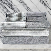 8 dona polyester chiziqli sochiq to'plami, 4 ta yuvish sochiqlari, 2 ta qo'l sochiqlari va 2 ta hammom sochiqlari. Suvni yaxshi so'radigan, tez quriydigan va hammomda foydalanish uchun ideal.