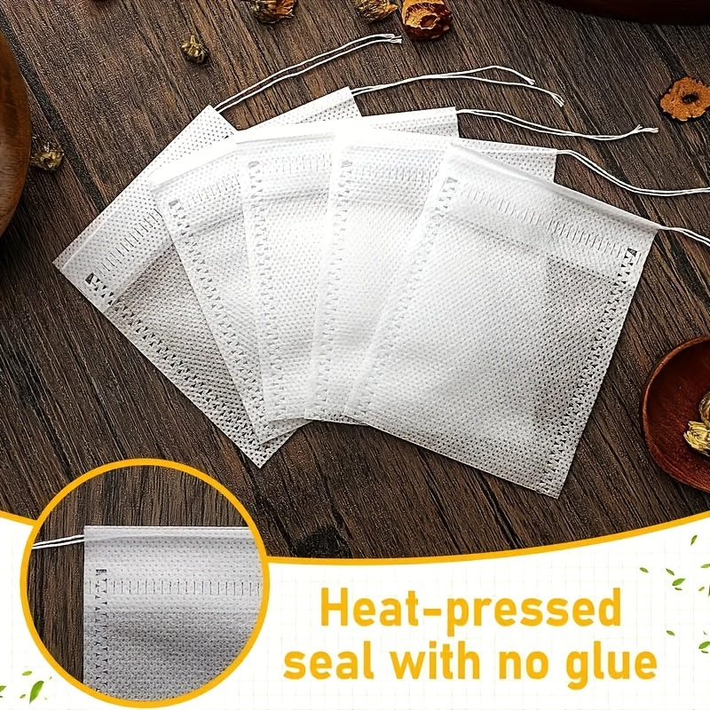 Pack of 100 Disposable Tea Bags with Drawstring, Clear Non-Woven Fabric, Scented Tea Leaves
