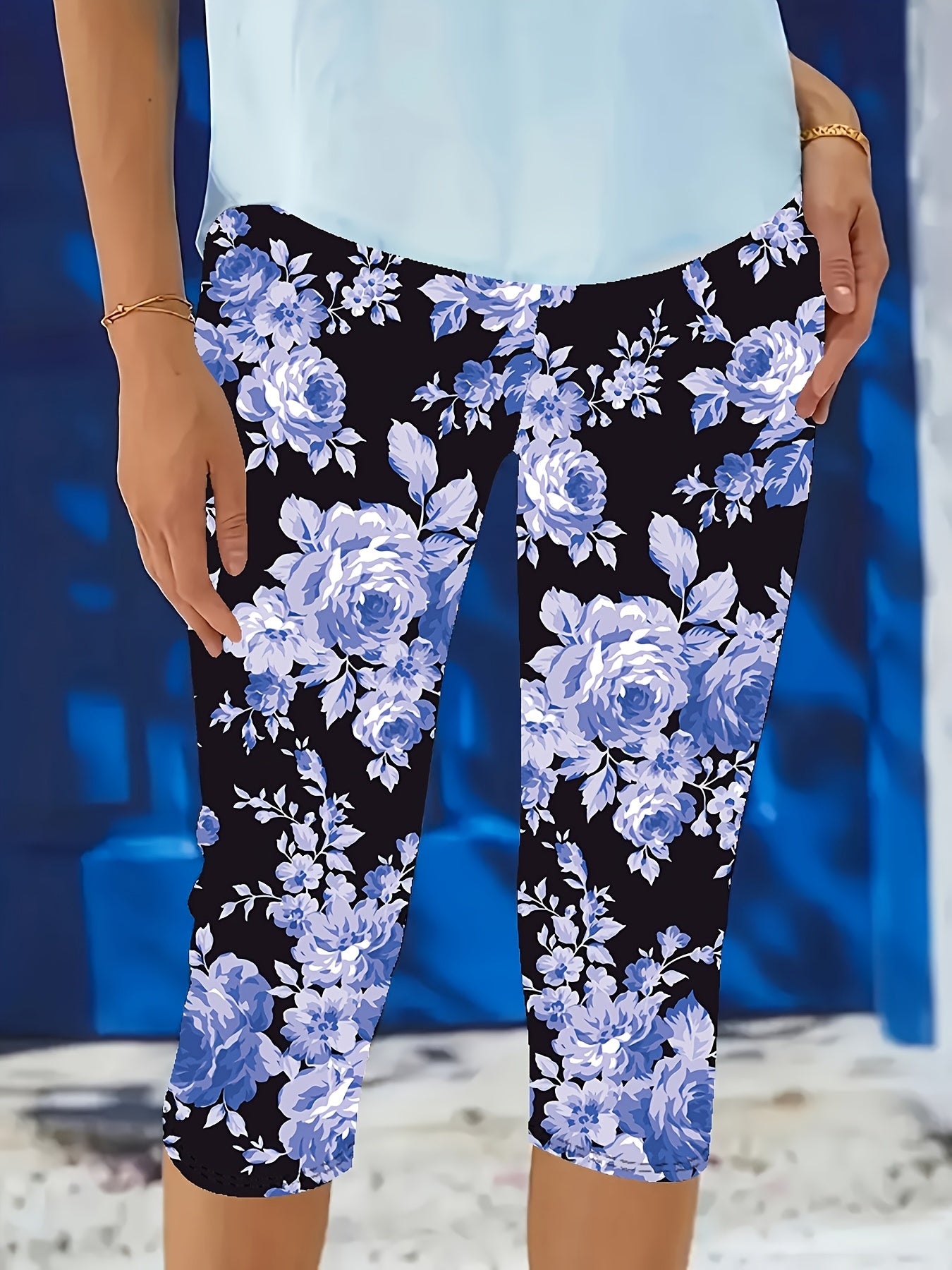 Women's Black Floral Print Slim-Fit Capri Pants with Blue Roses