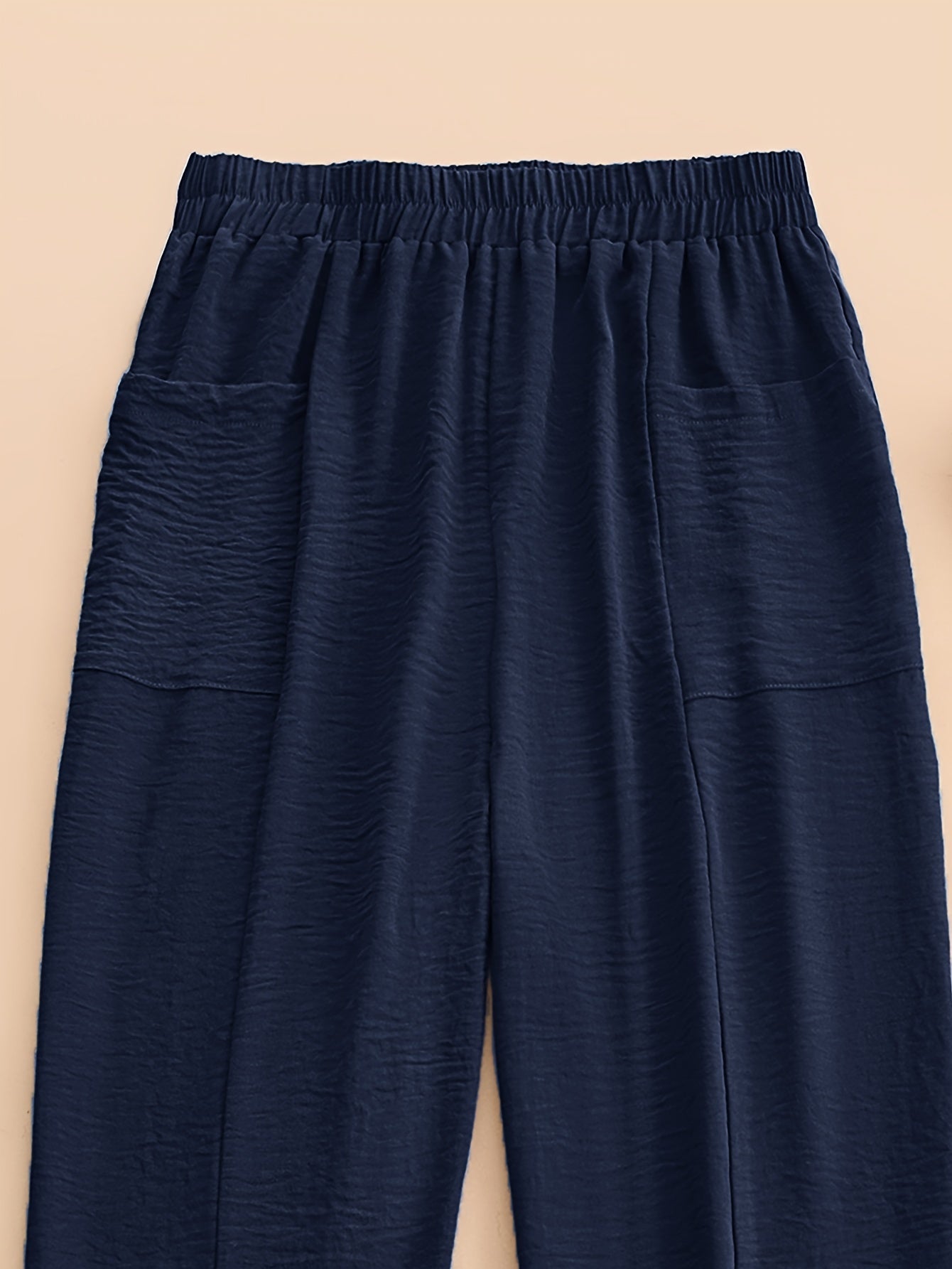 Pantalones de color sólido de talla grande con bolsillos y cintura elástica para mujer primavera verano