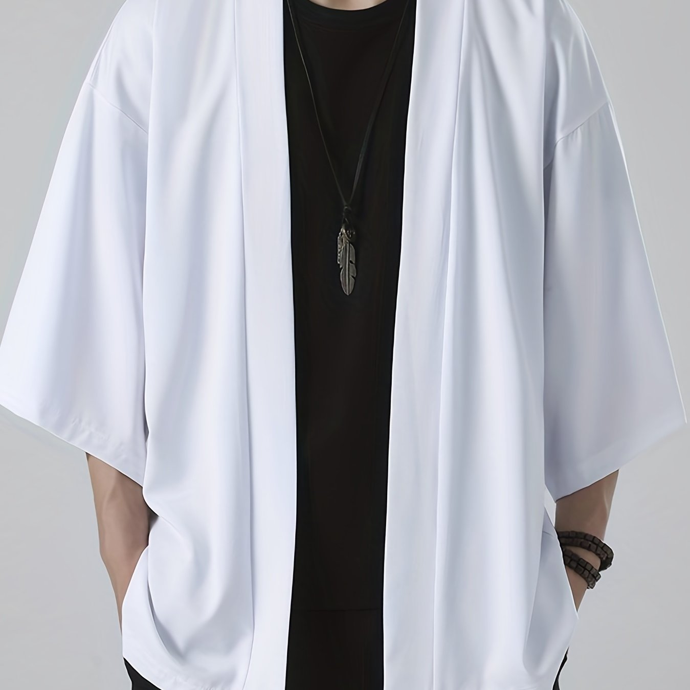 Yengil poliester yapon kimonosi kardigani erkaklar uchun mustahkam xantal sariq rangda, yarim yenglari va ochiq old qismi bilan. Yozgi tasodifiy kiyim uchun mos, yetuk estetikaga ega. O'z ichiga oladi