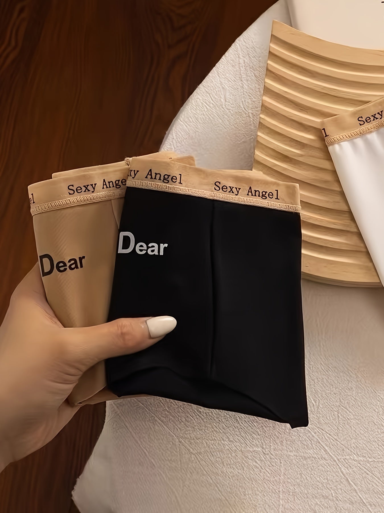 Три комплекта вязаных женских трусиков-треугольников средней посадки.