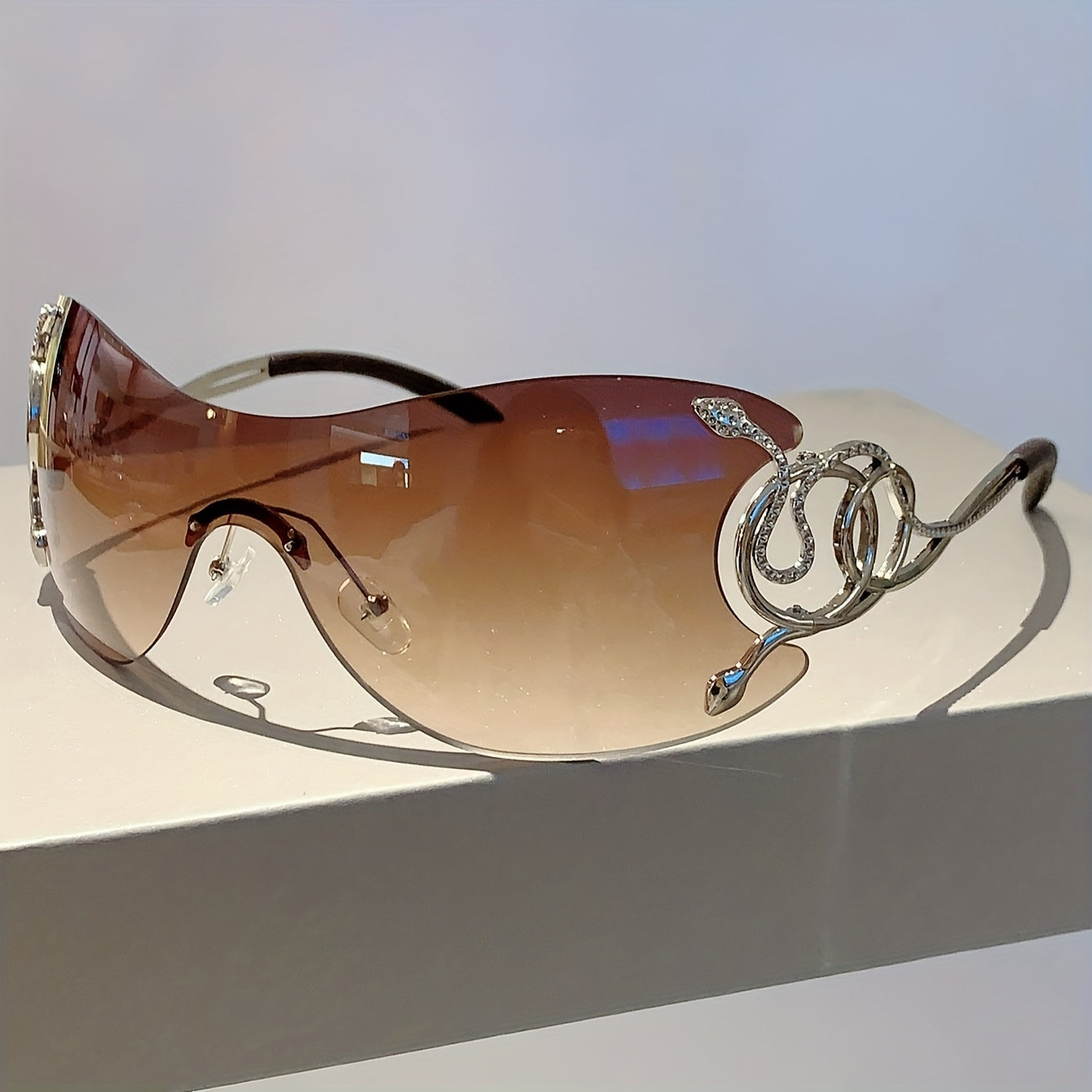 Women Y2K Style One-Piece Lens Sunglasses with Silver Snake Detail