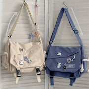 Unisex Canvas Shoulder Bag with Adjustable Strap for School Travel and Daily Use in White Pink Blue Black