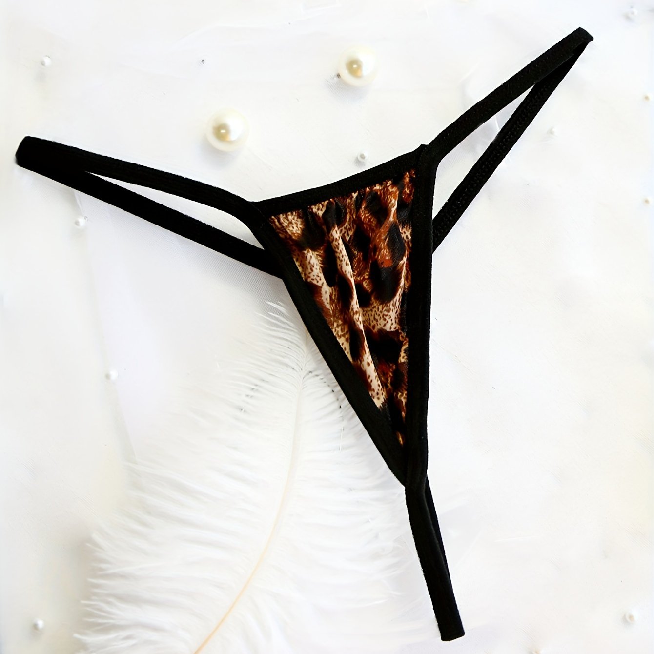 Panties tanga de tiro bajo para mujer, transpirable, mezcla de nylon, detalle cruzado, lencería semi-transparente