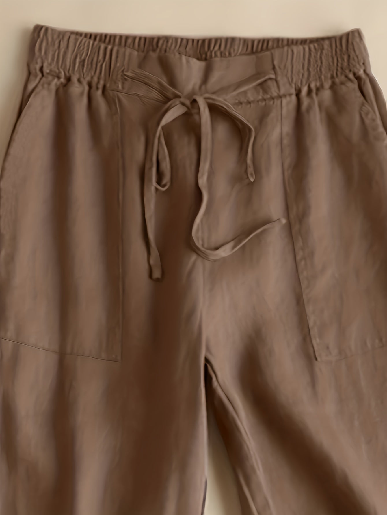 Pantalones de mujer de talla grande con bolsillos inclinados y cintura elástica para primavera y otoño