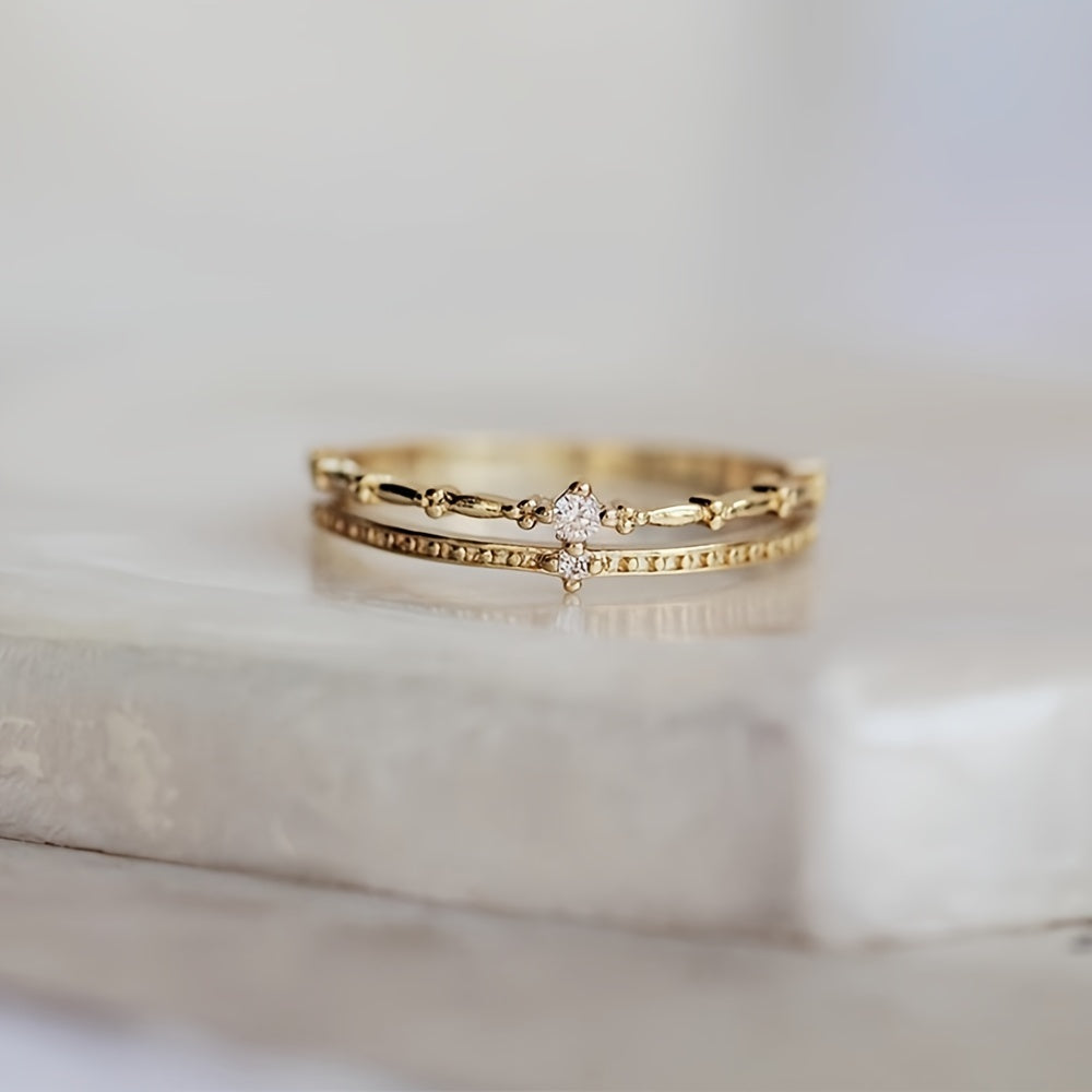 Zarif va chiroyli S925 kumush zirkoni ikki qatlamli toj uzuk, hashamat va retro jozibasi bilan to'la, bu esa uni ayollar uchun 14-fevral yoki har qanday maxsus tadbirda mukammal sovg'a qiladi.