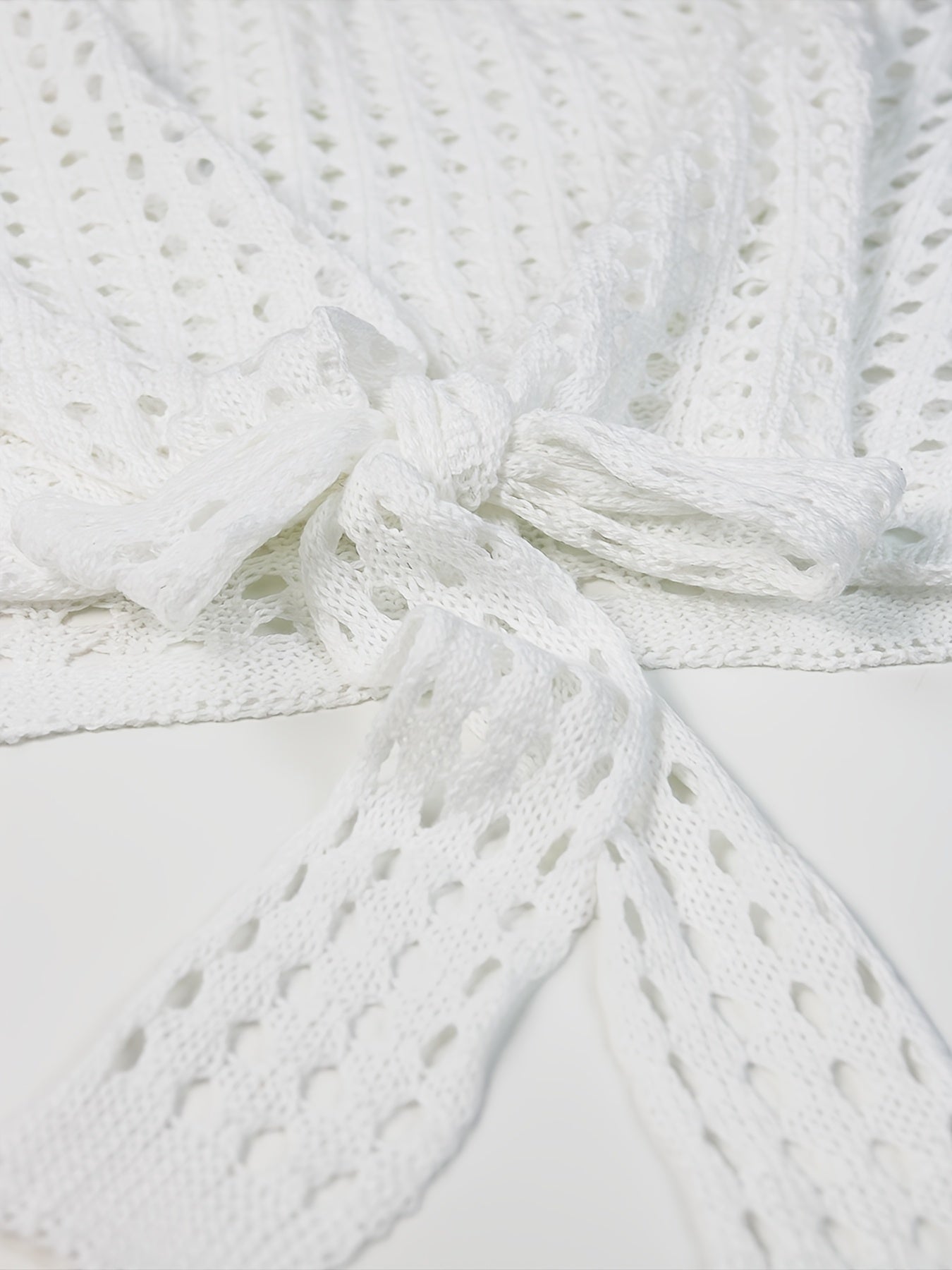 Suéter de punto con escote en V para mujer talla grande con lazo y tela elástica