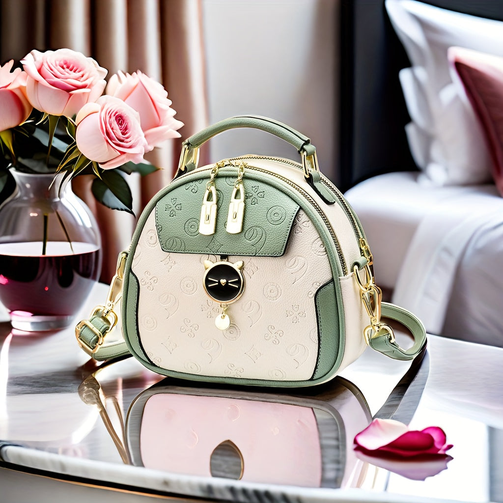 Bolso cruzado redondo negro para mujer con correa ajustable y cierre de cremallera