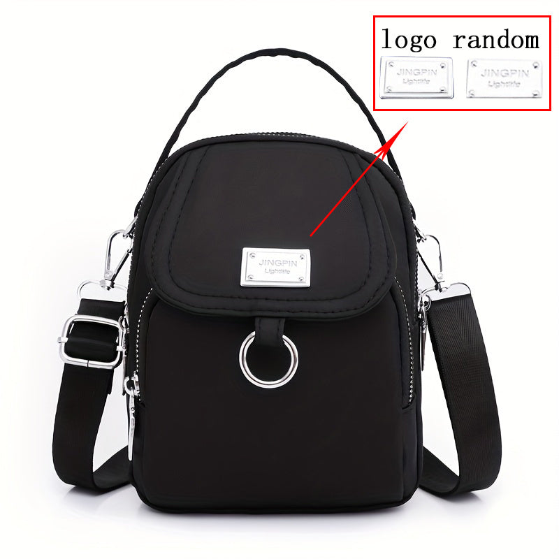 Ayollar uchun nylon crossbody sumka, katta sig'imli, bir rangli, zip yopilishi, polyester astarli, kundalik foydalanish va maxsus tadbirlar uchun ko'p funksiyali, qizil yoki qora ranglarda mavjud.