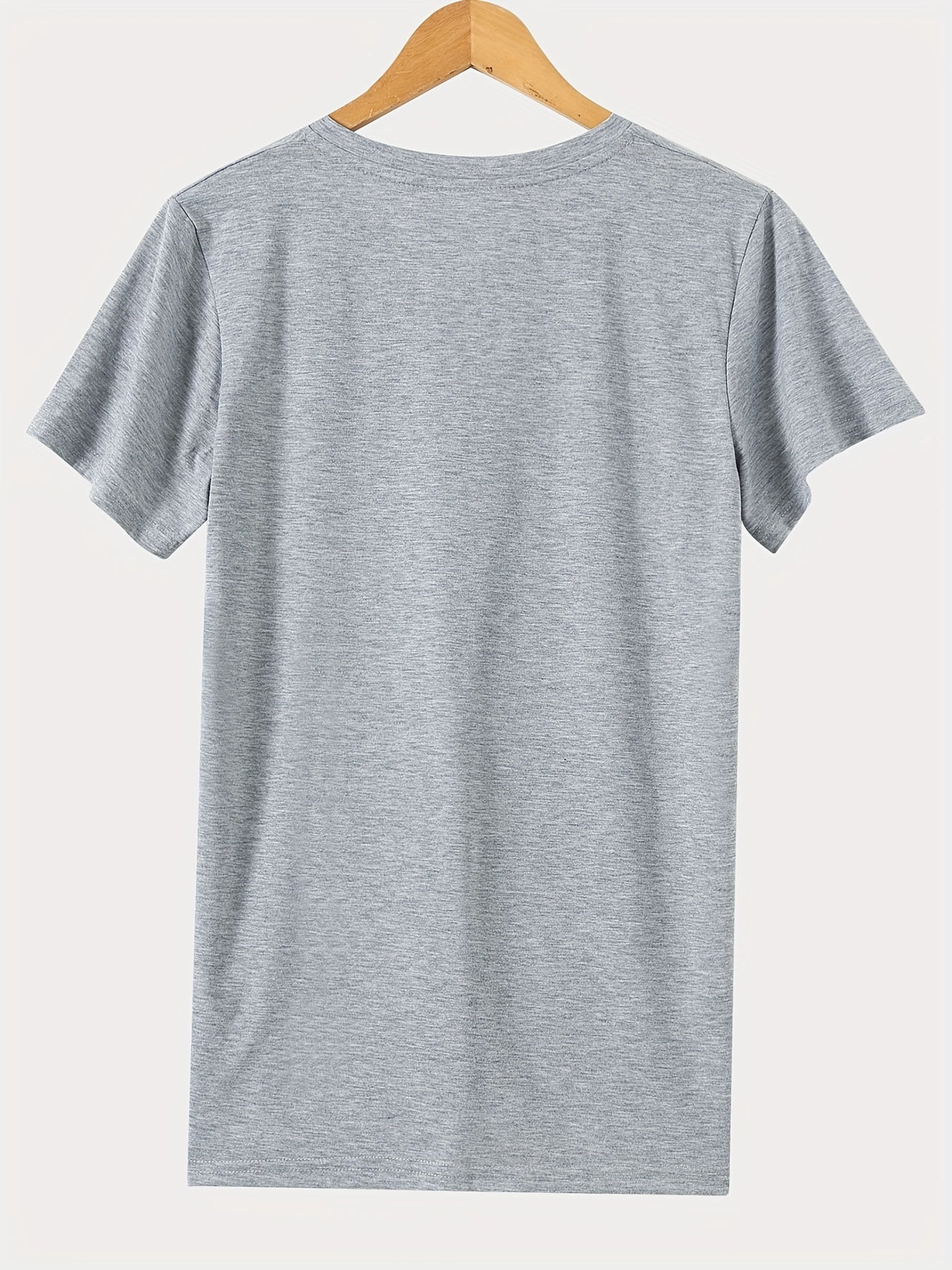 Camiseta de manga corta con escote en V y lema de diente de león para mujer talla grande