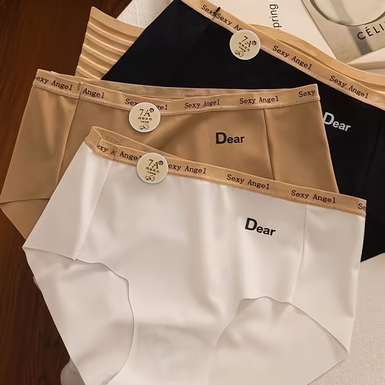 Три комплекта вязаных женских трусиков-треугольников средней посадки.