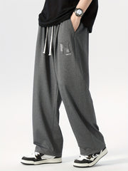 Pantalones deportivos de corte holgado para hombre con patrón geométrico, poliéster elastano, lavado a máquina, tallas grandes