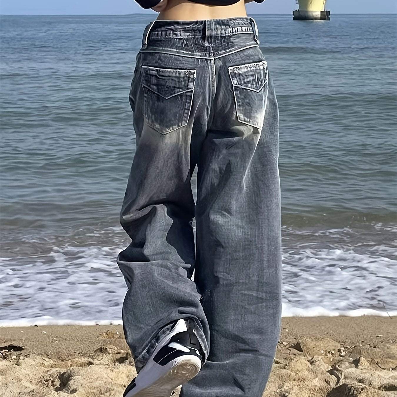 Jeans de mezclilla desgastados de tiro alto y pierna ancha con inspiración vintage para mujer