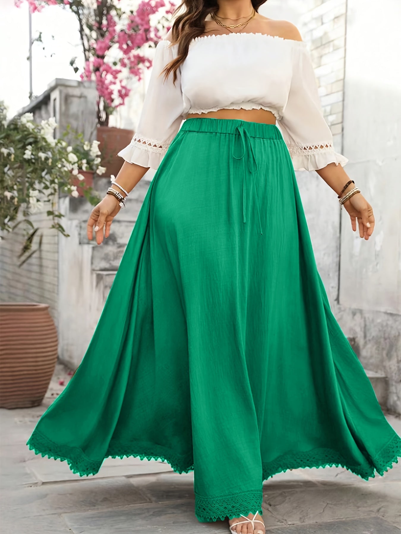 Falda midi de línea A para mujer talla grande con dobladillo de encaje, de tiro alto y color sólido