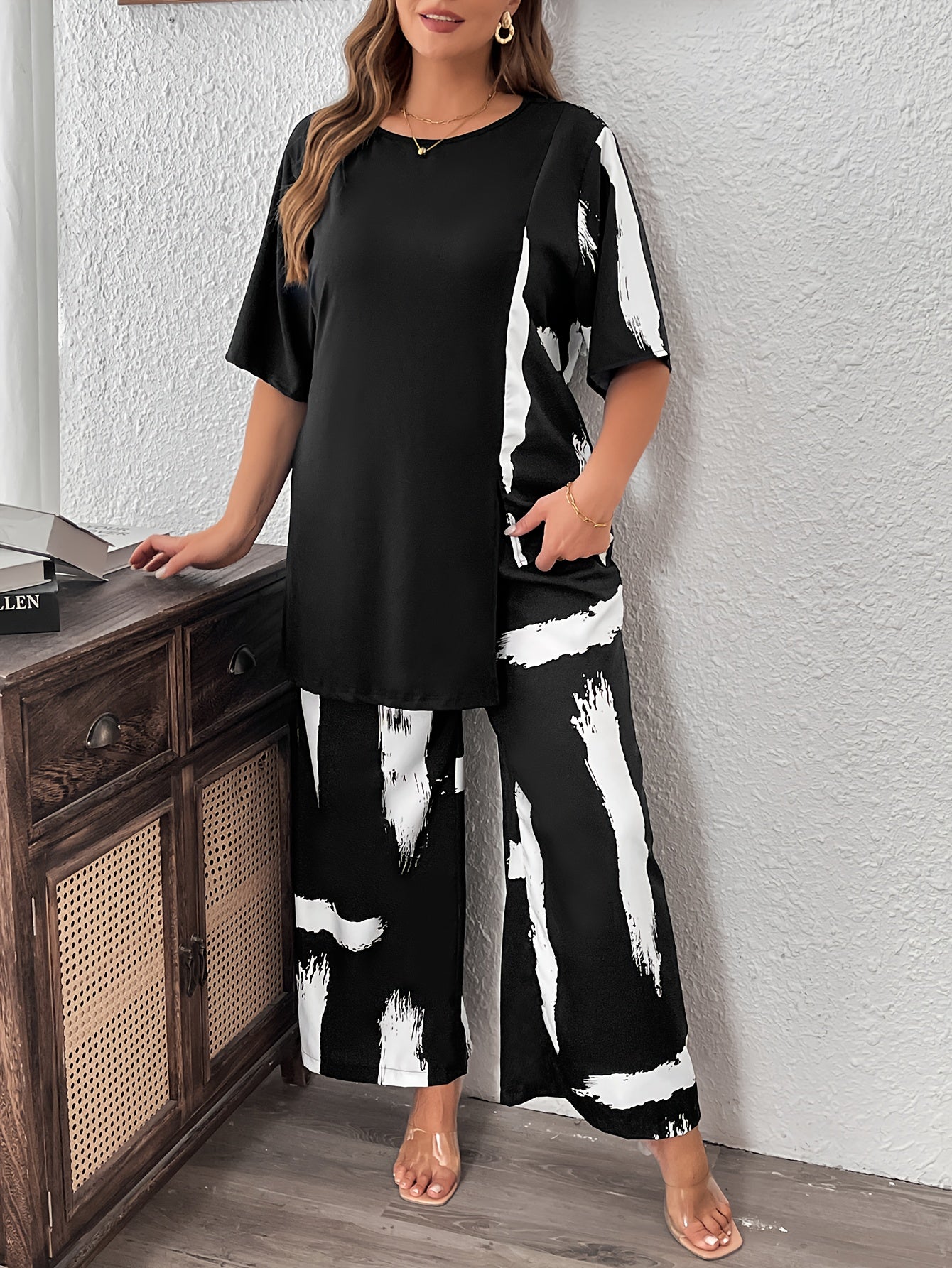 Traje de mujer de talla grande de poliéster tejido con estampado aleatorio y detalles asimétricos