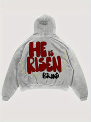 Y2K uslubidagi polyester xuddi "U tirildi" grafikasiga ega, keng cho'ntakli va barcha fasllar uchun uzun yengli hoody.