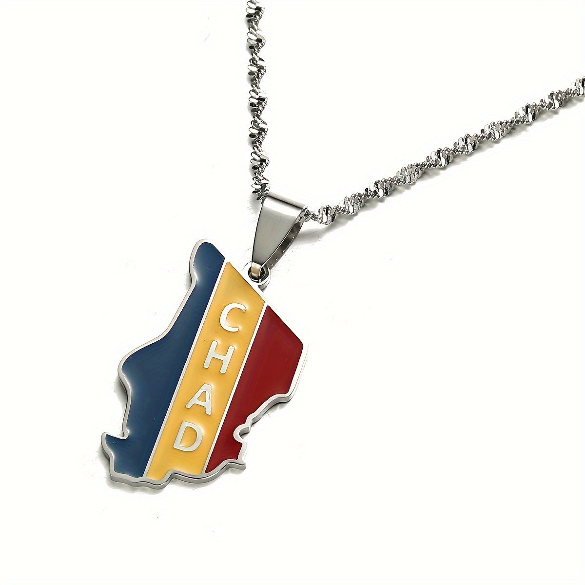 Chad Respublikasining zamonaviy pendanti - zanglamas po'latdan tayyorlangan, oltin va kumush ranglarining aralashmasi bilan, norasmiy kiyim va partiyalar uchun mukammal.