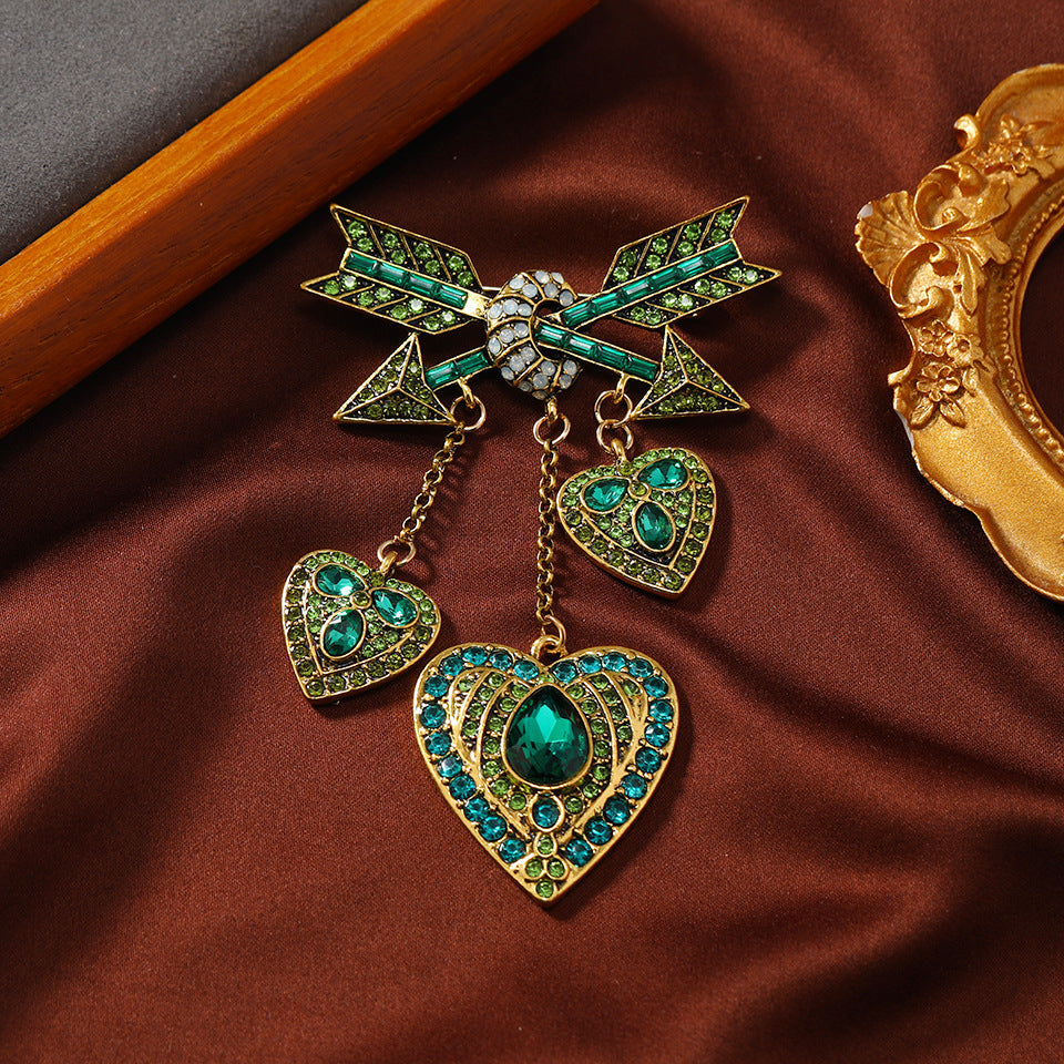 Vintage Heart Brooch with Cupid Arrow and Tassel Accent