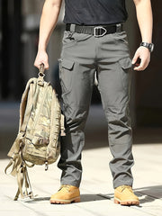 Pantalones tácticos para hombre de color gris oscuro, ligeros de poliéster, con múltiples bolsillos, para actividades al aire libre, senderismo y estilo militar