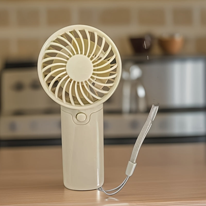 Batareya bilan ta'minlanmagan portativ qo‘l fan, yengil va sozlanadigan, qulay va ijodiy dizayn, cho'ntak o'lchamida va chiroyli.