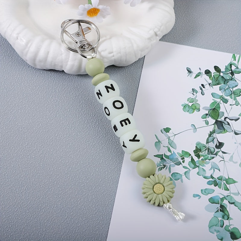 Индивидуальный силиконовый брелок с светящимися в темноте буквами и подвеской в виде цветка для сумок и рюкзаков