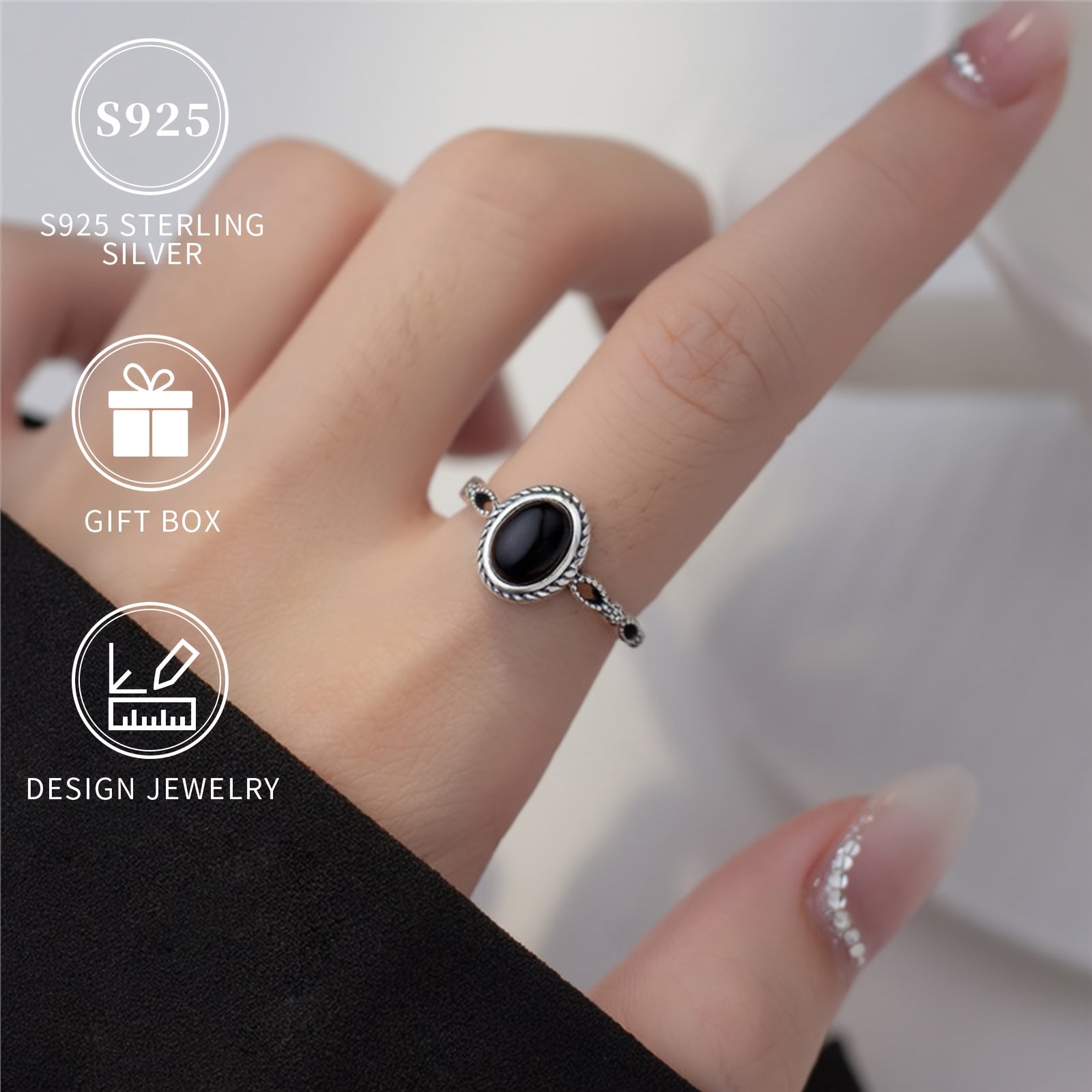 Ayollar uchun qora agate va oltin qoplamali detallarga ega Sterling Silver oval uzuk