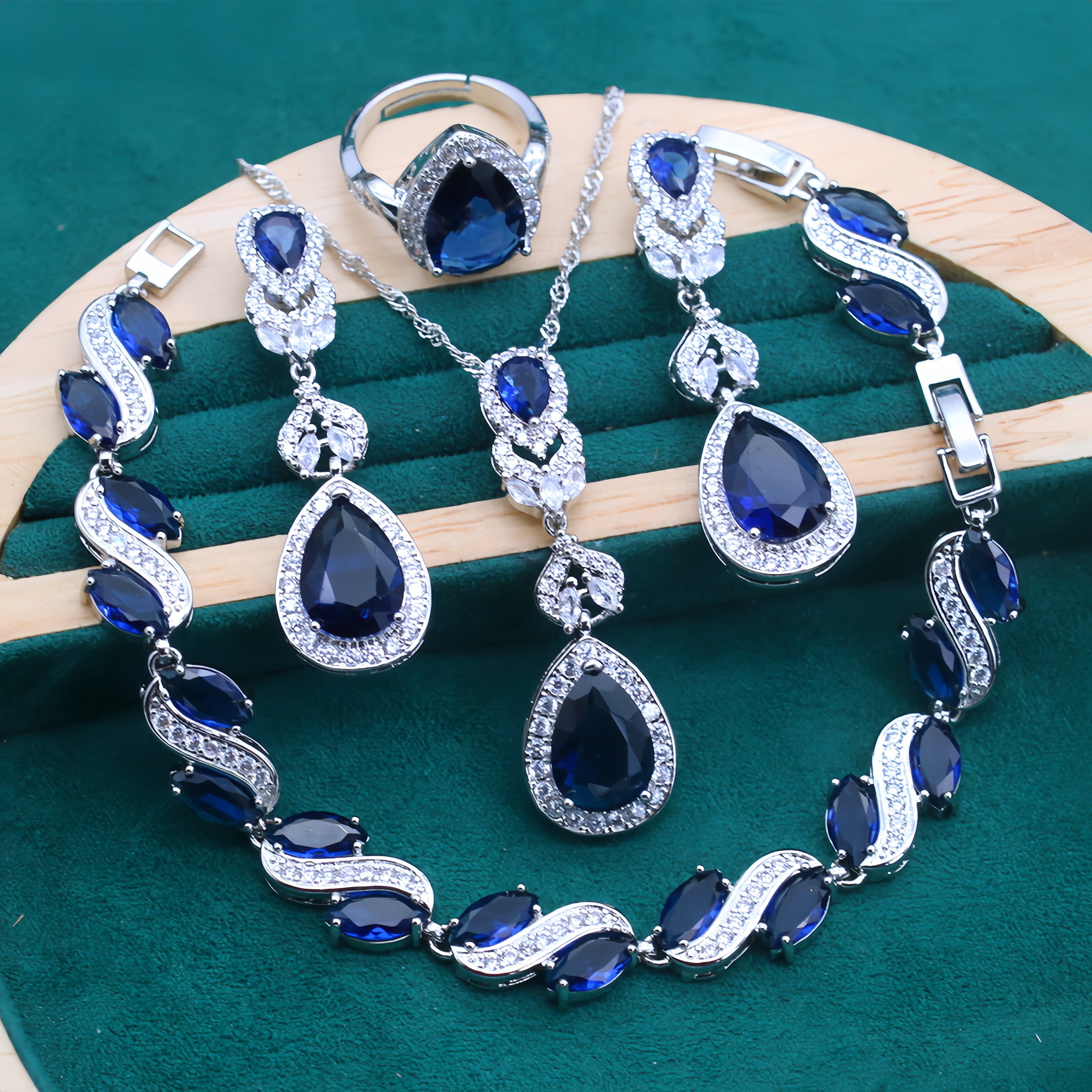 Conjunto de joyería de cobre con gemas azules sintéticas, collar, anillo, pendientes y pulsera chapados en platino 5 piezas