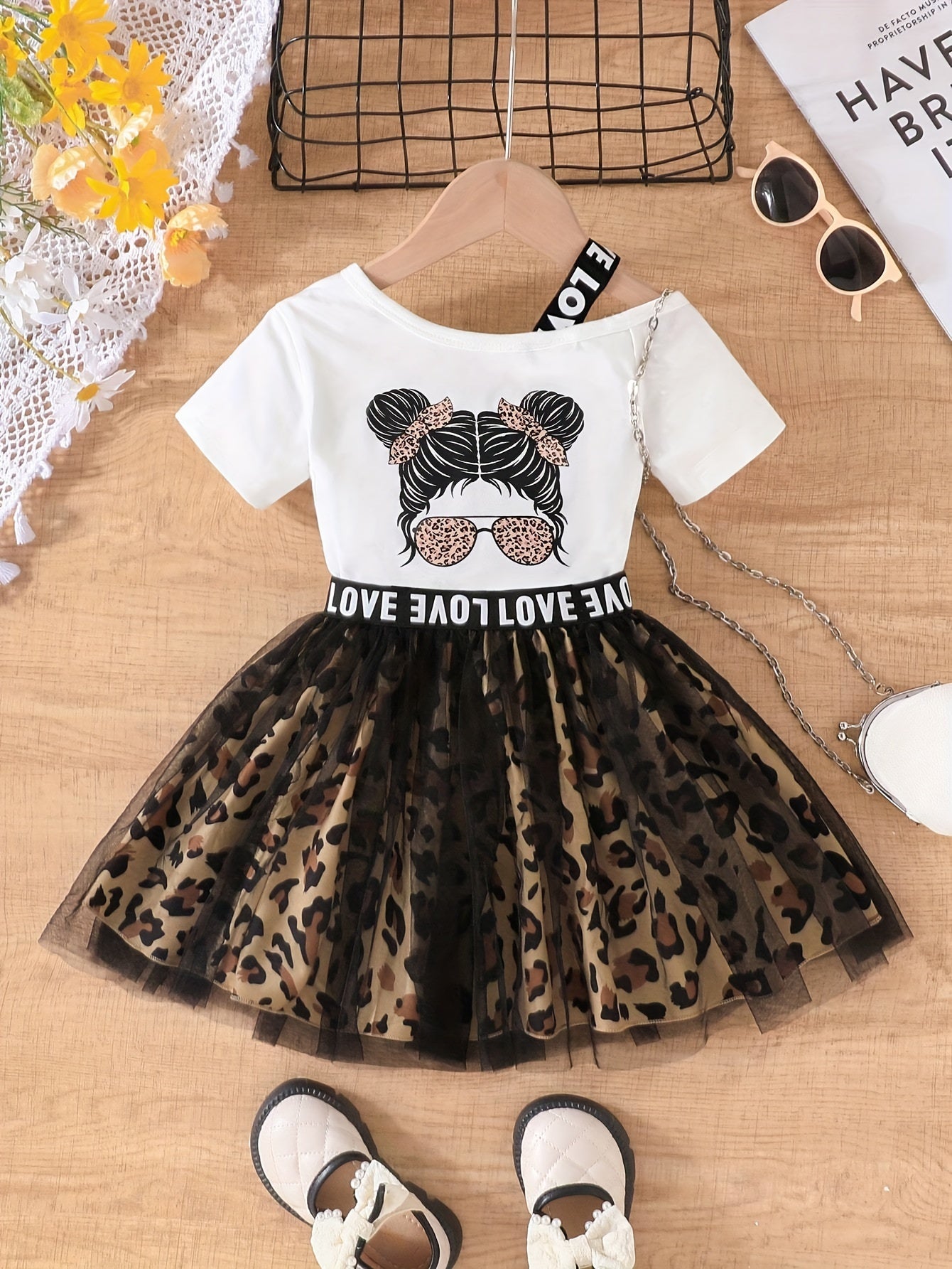 Quyosh ko'zligi qiz patchwork to'r yubka, leopard naqshli tafsilotlar bilan